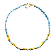 Charger l'image dans la galerie, Collier en cordon bleu-gris et tubes dorés